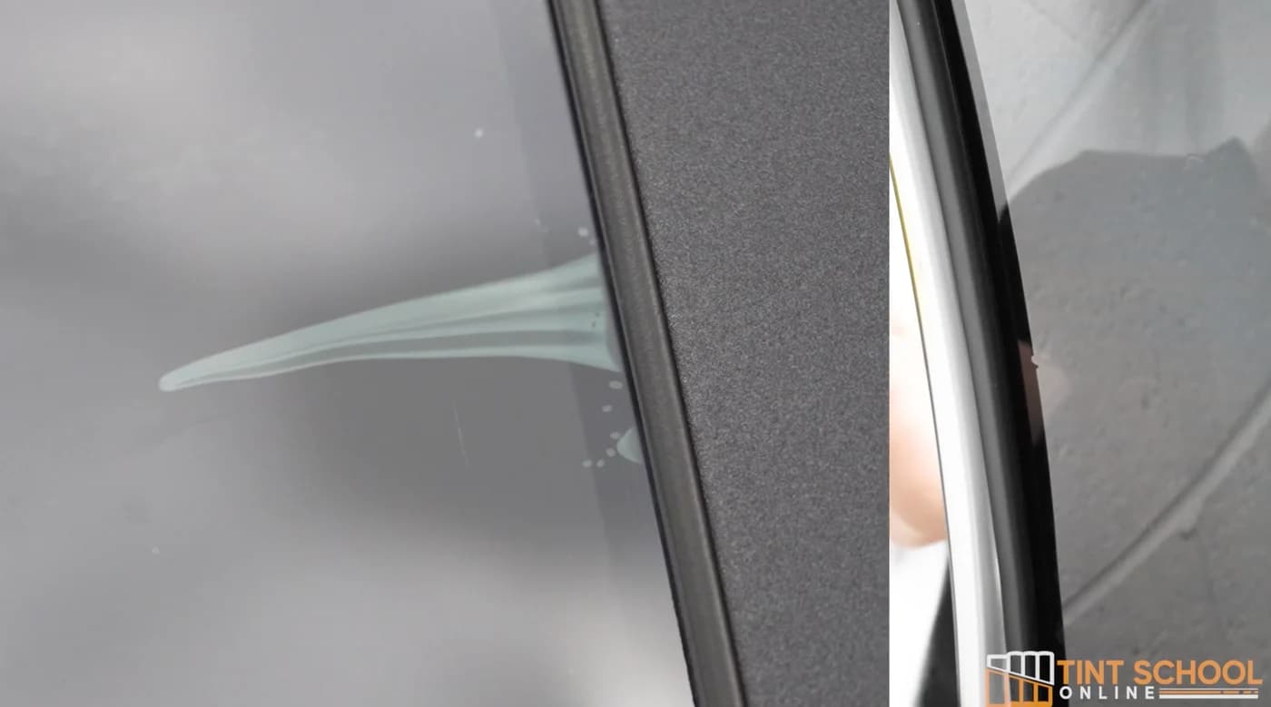 Close-up of film along a vehicle window edge